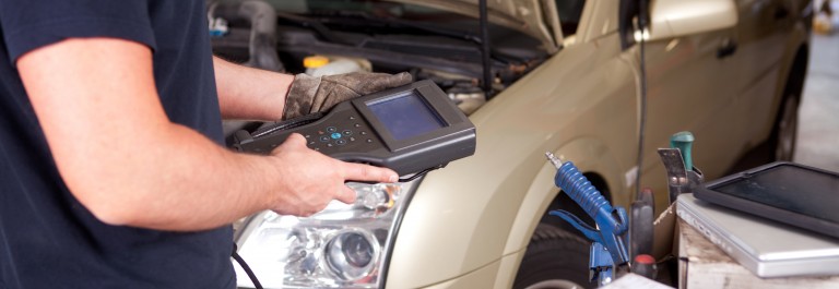 A mechanic running a diagnostic check